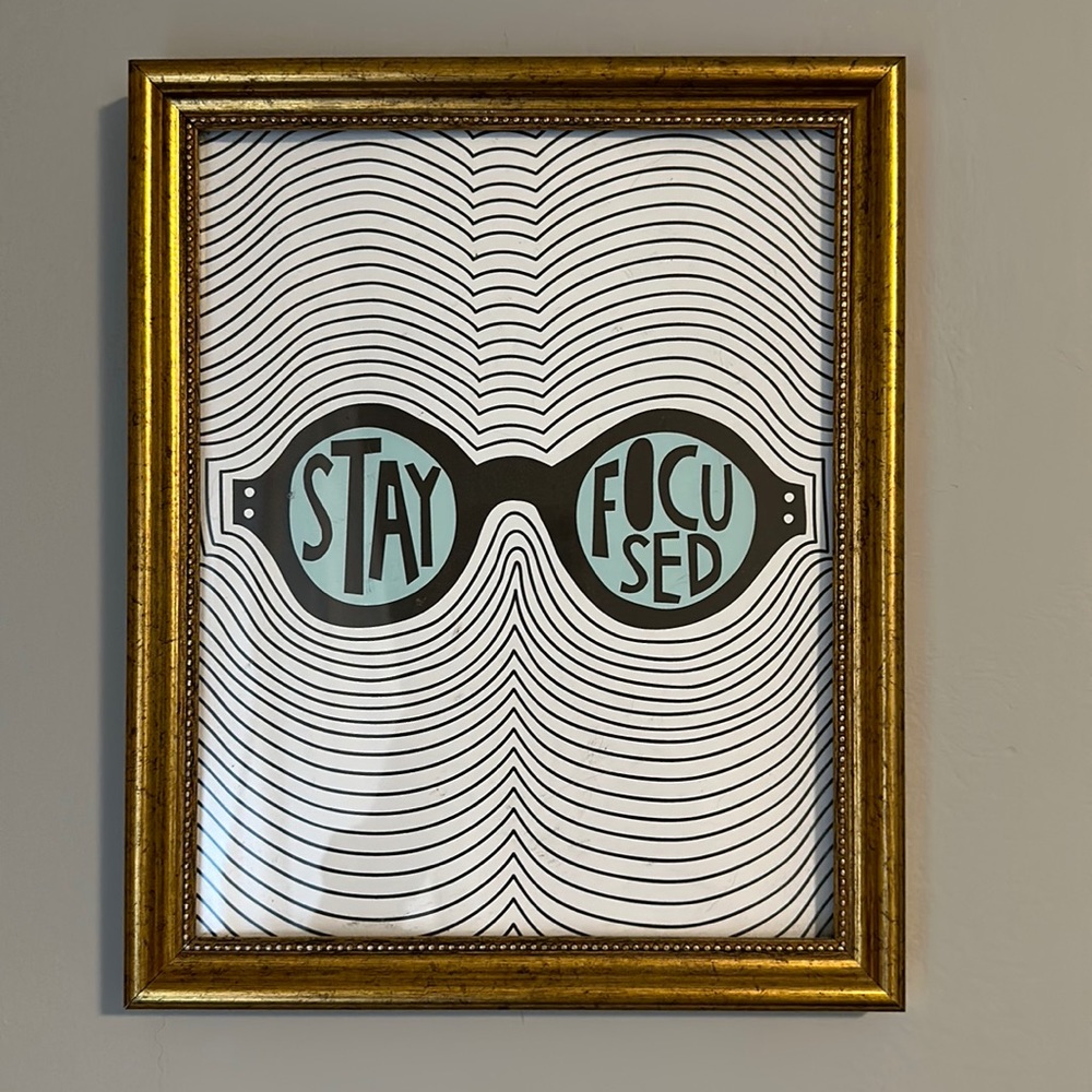 “Stay Focused” print and gold antique frame